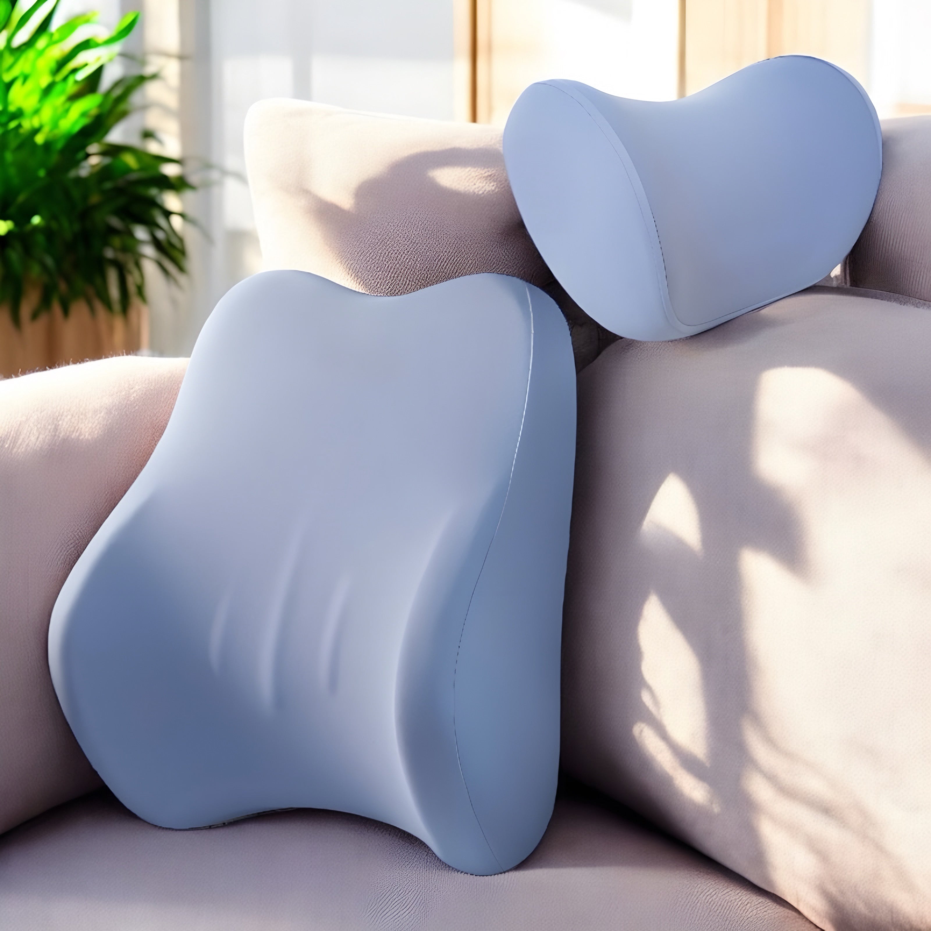 NuVibe™ LumbarEase Cushion Set in Baby Blue, beautifully placed in a bright and sunny living room, offering a fresh and ergonomic design.