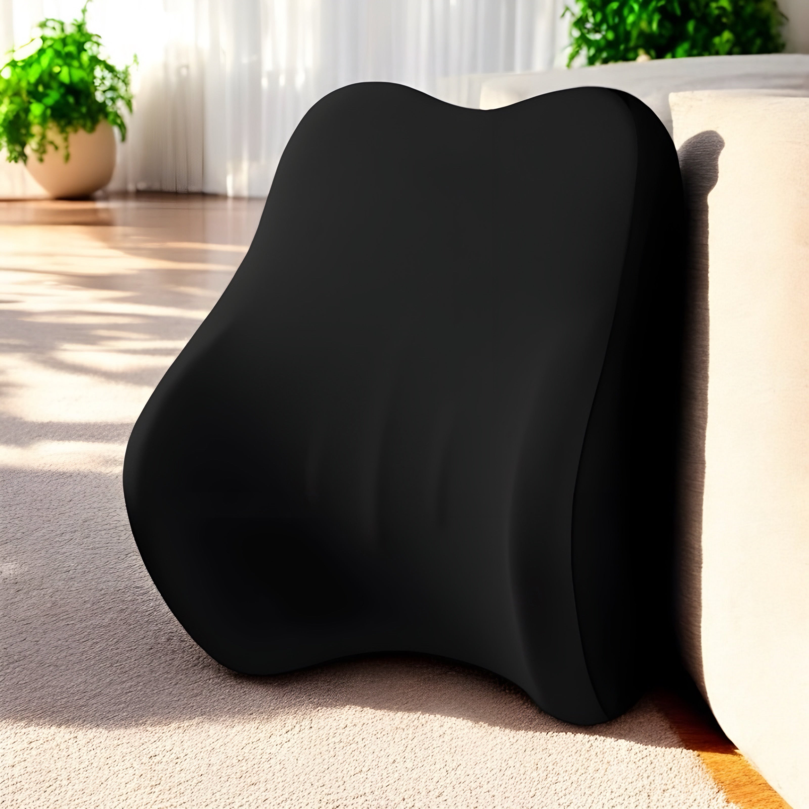 NuVibe™ LumbarEase Cushion Set in Pure Black, featured in a bright and sunny living room, combining sleek design with ultimate back support.
