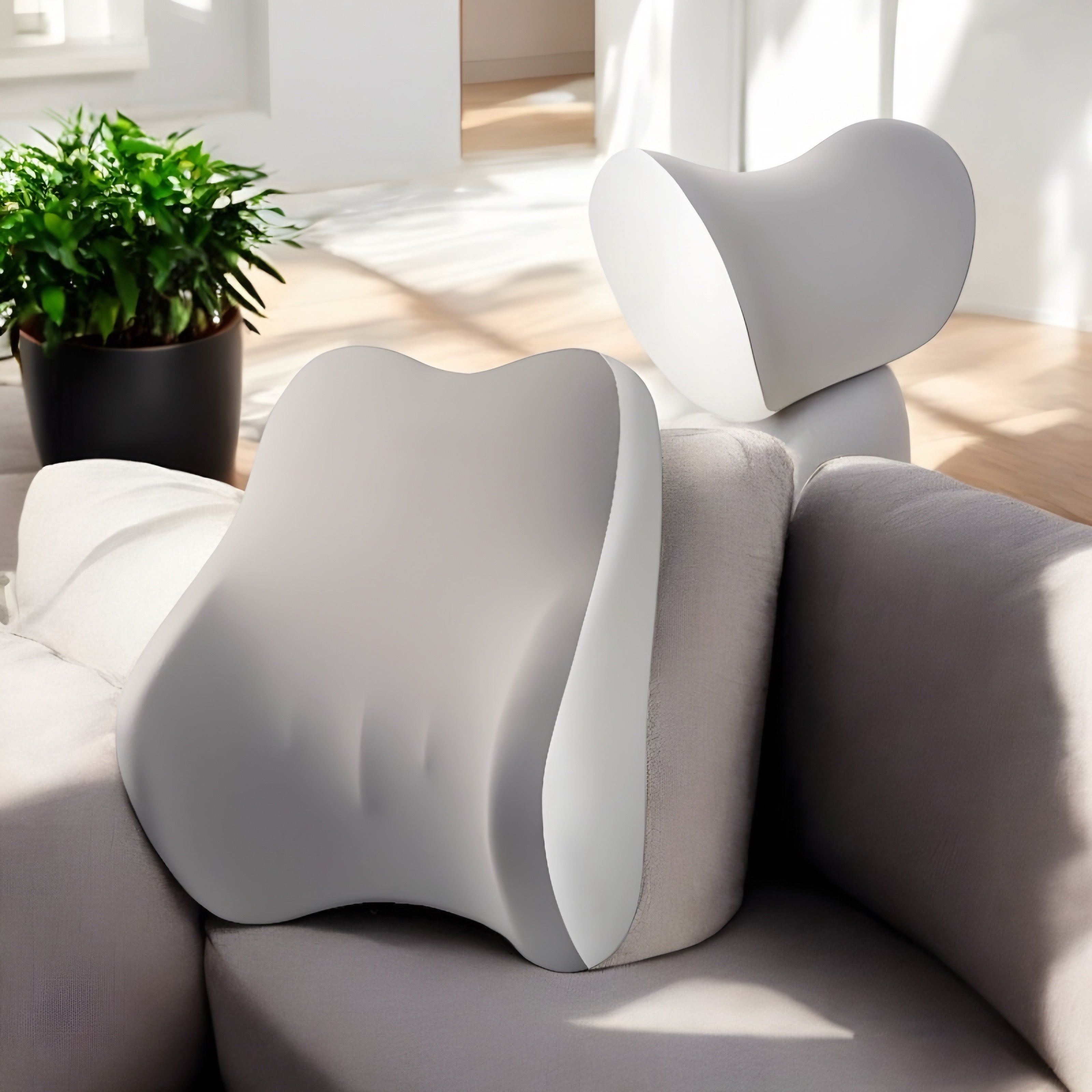 NuVibe™ LumbarEase Cushion Set in White Moon, elegantly placed in a bright and airy living room, offering a stylish and ergonomic design.