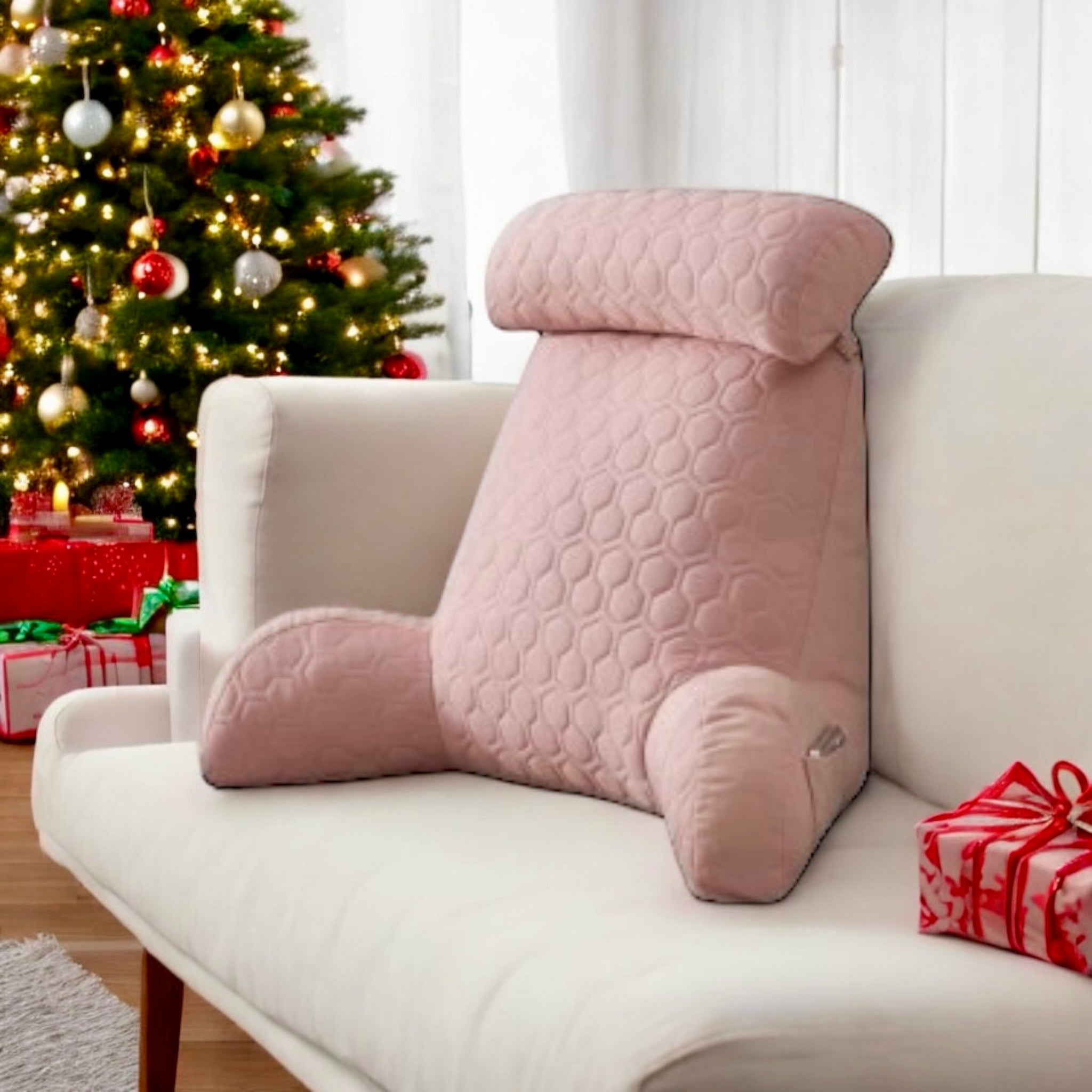 Pink NuVibe Cushion with ergonomic design, plush velvet cover, and detachable headrest, perfect for pain relief and posture support while working, gaming, or relaxing at home or the office.